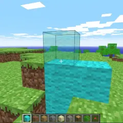 Gra w **minecraft w przeglądarce**. Gracz buduje wieżę z niebieskich bloków, na której stawia szklaną ścianę.