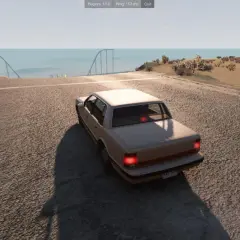 Gra BeamNG.drive na pustynnej mapie, z opcjami "Scramble Everything!" i "Random Vehicle". Sprawdź wymagania gry!