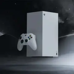 Biały kontroler Xbox i konsola unoszą się w mrocznym, gwieździstym krajobrazie. To był przełom, kiedy wyszedł Xbox Series X.