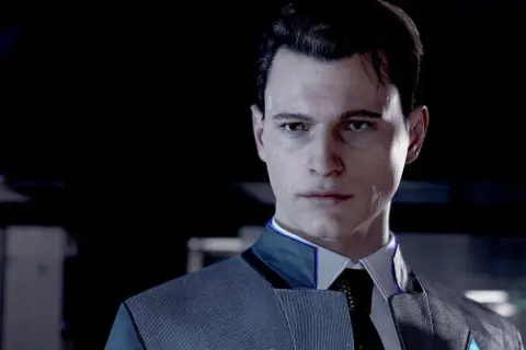 Connor z Detroit: Become Human, android w eleganckim garniturze, z niebieskim symbolem na skroni.