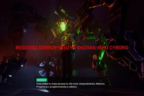 Potężny cyborg z zielonymi światłami i bronią groźnie patrzy na gracza. Tekst "BĘDZIESZ DOBRZE SŁUŻYĆ SHODAN JAKO CYBORG" sugeruje, że gracz stanie się częścią tej maszyny.