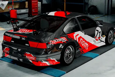 Wyścigowy samochód w garażu, gotowy do akcji w BeamNG Drive za darmo. Czerwono-białe malowanie z numerem 71.