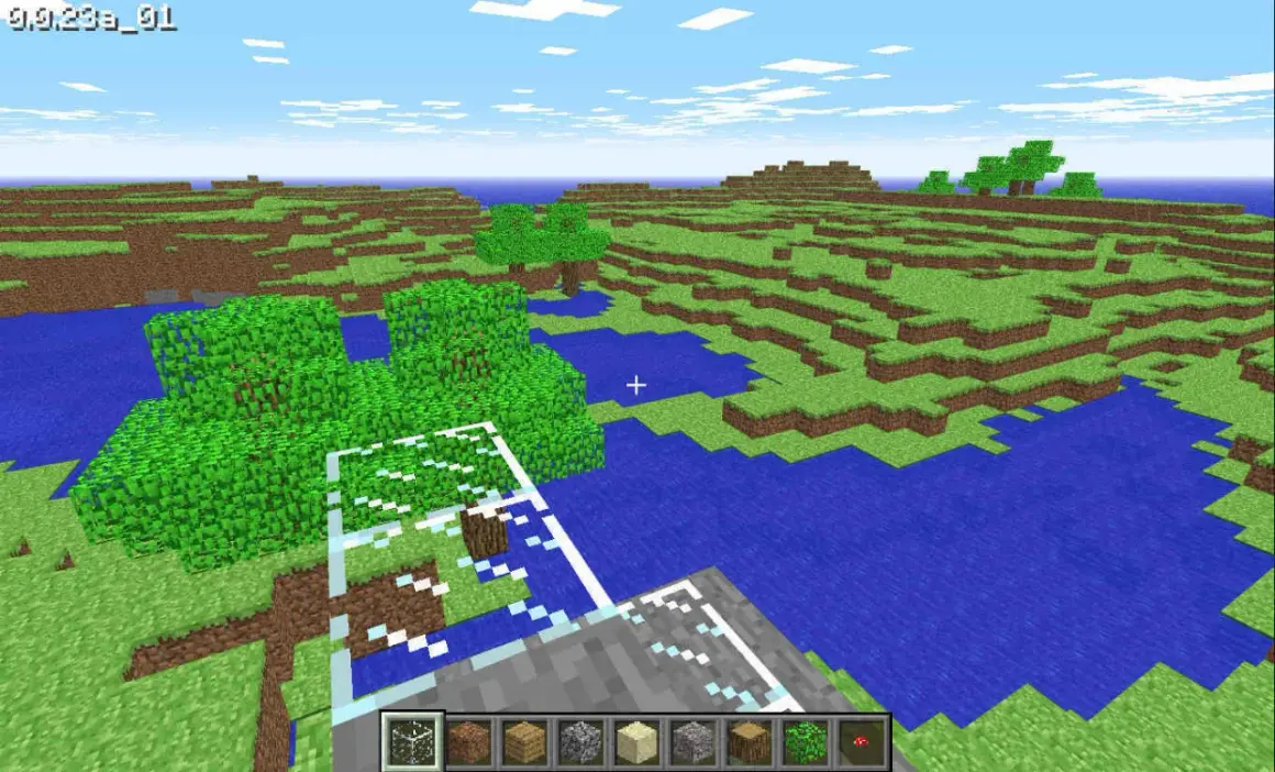 Wczesna wersja Minecrafta z blokami trawy, wody i drzew.