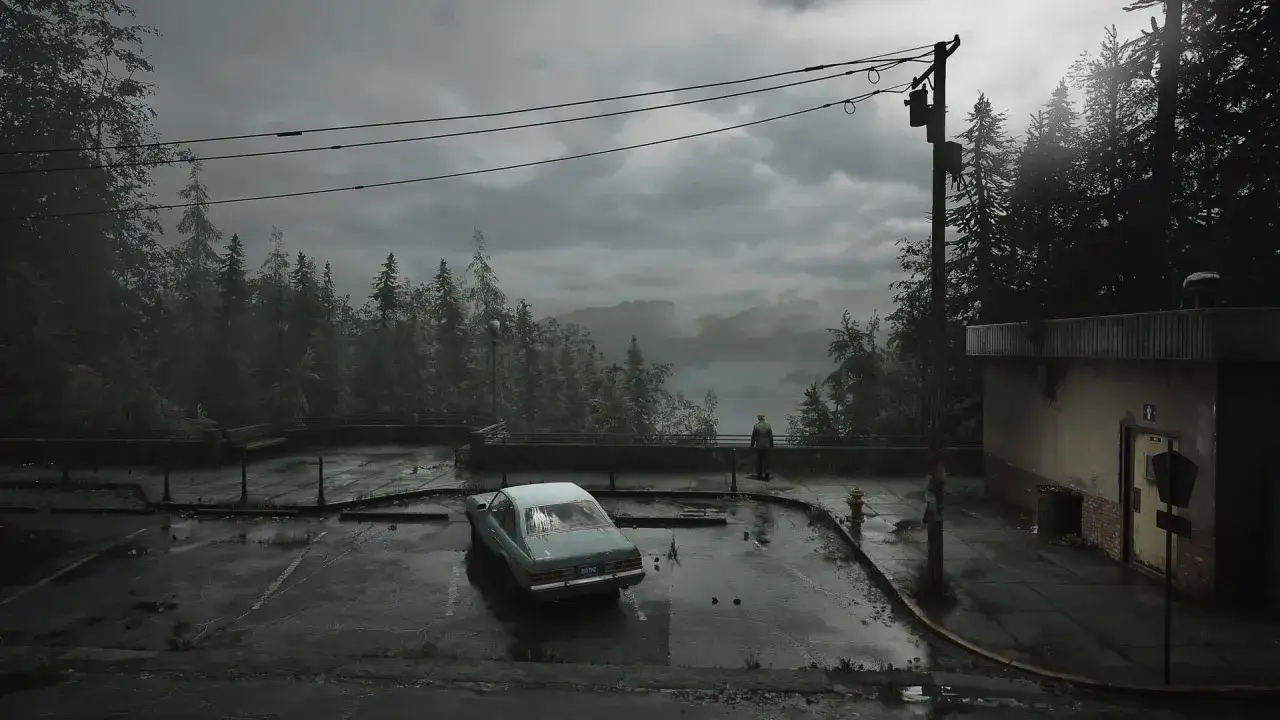 Mroczny parking, opuszczony samochód i samotna postać na tle mglistego jeziora. Klimat jak z Silent Hill 1 remake.