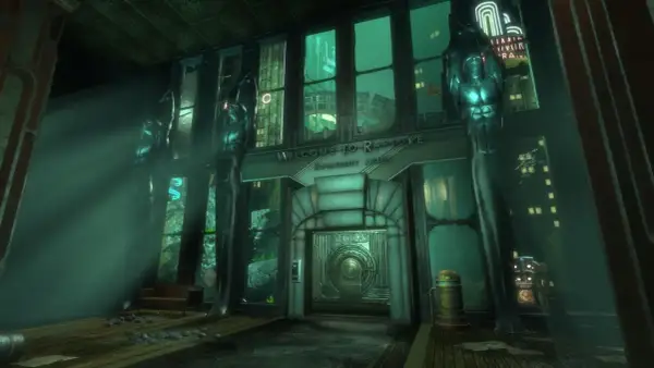Wejście do Rapture z napisem "Welcome to Rapture. Opportunity awaits" i rzeźbami.