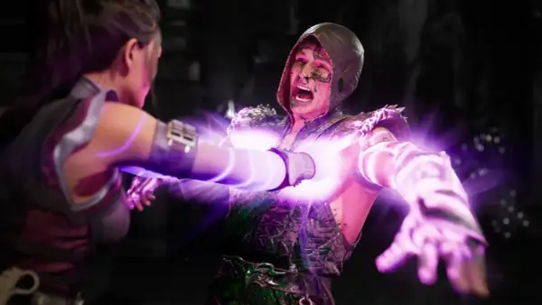 Kobieta zadaje śmiertelny cios, przebijając przeciwnika fioletową energią. To brutalny fatality w stylu Mortal Kombat.