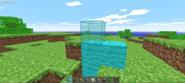 Gra w **minecraft w przeglądarce**. Gracz buduje wieżę z niebieskich bloków, na której stawia szklaną ścianę.