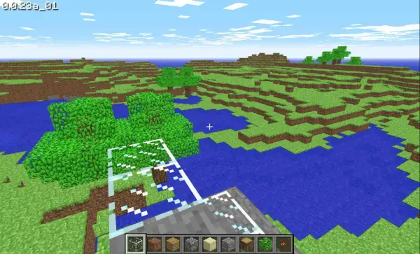 Wczesna wersja Minecrafta z blokami trawy, wody i drzew.